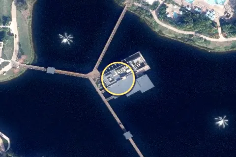 Three Bridges Bar and Grill at Villa del Lago from the air, 2026